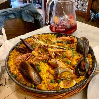Restaurante Bodega Joan - Seafood paella and (half finished!) pitcher of sangria - Tapas Bars Near Me - Barcelona, B Restaurante Bodega Joan - Seafood paella and (half finished!) pitcher of sangria - Tapas Bars Near Me - Barcelona, B