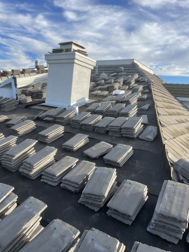 Slide of Prestige Roofing Service