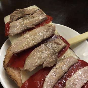 Tasca El Corral - This was on the tostada menu. Red peppers, cheese and tuna. - Tapas Bars Near Me - Barcelona, B Tasca El Corral - This was on the tostada menu. Red peppers, cheese and tuna. - Tapas Bars Near Me - Barcelona, B