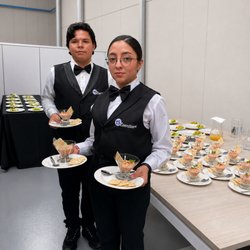 Ts Events - Professional catering staff providing impeccable service and beautifully presented appetizers for corporate and private events.