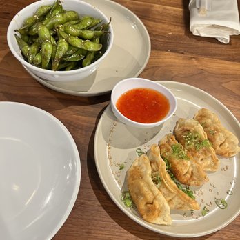 MUSE Fusion+Sushi - Edamame (not cooked enough) and potstickers - Sushi Bars Near Me - Austin, Texas MUSE Fusion+Sushi - Edamame (not cooked enough) and potstickers - Sushi Bars Near Me - Austin, Texas