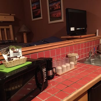 Red Cliffs Lodge Moab - Kitchen area of townhouse-style cabin. - Hotels Near Me - Moab, Utah