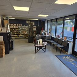 Ave's Lock and Key - To the right is the waiting area, the safes, and the door knobs and deadbolts. Also our handgun and shotgun selection.