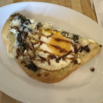 Voula's Greek Sweets - Flatbread pizza (half) with an egg on top - Desserts Near Me - Rochester, New York Voula's Greek Sweets - Flatbread pizza (half) with an egg on top - Desserts Near Me - Rochester, New York