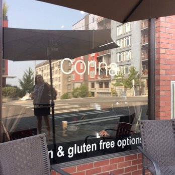 Corina Bakery - Front of store with a few tables outside. - Bakeries Near Me - Tacoma, Washington