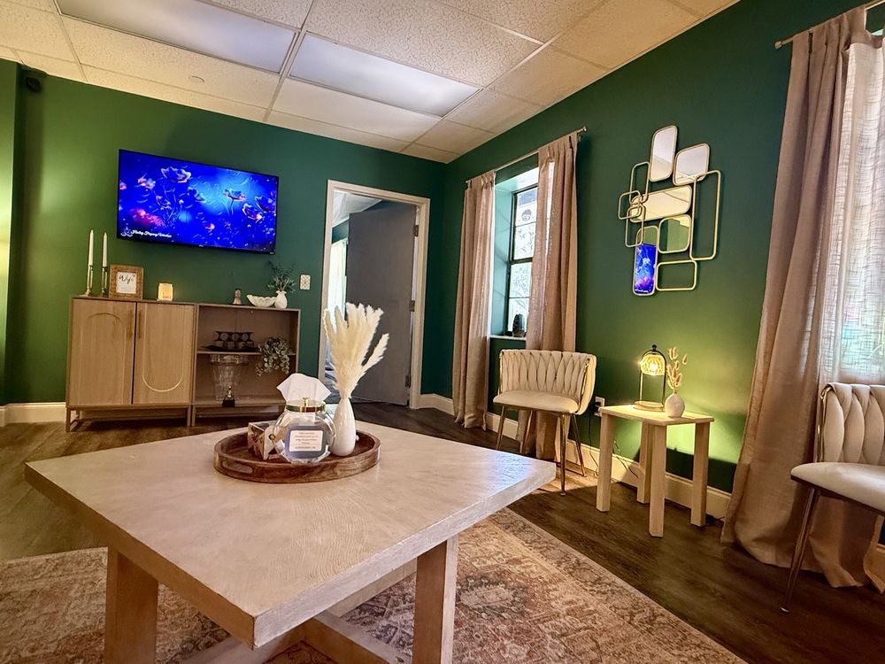 Elevated Wellness Massage & Spa Logo