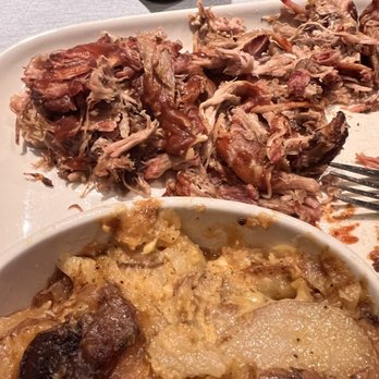 Jack Stack Barbecue - Freight House - Pulled pork dinner (comes with barbecue sauce on it).  Cheesy Potato Bake - Barbeque Near Me - Kansas City, Missouri
