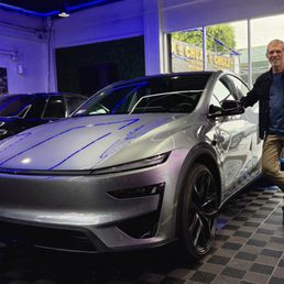 2026 Tesla Performance Model Y with PPF and ceramic coating. The purple lines are reflections of the shop lights. 2026 Tesla Performance Model Y with PPF and ceramic coating. The purple lines are reflections of the shop lights.
