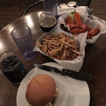 Taps - The chicken sandwich, salt and pepper fries, stage 2 buffalo wings and the Noon Moon stout. - New American Near Me - Petaluma, California Taps - The chicken sandwich, salt and pepper fries, stage 2 buffalo wings and the Noon Moon stout. - New American Near Me - Petaluma, California