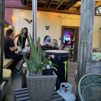 The Great Divide - a group of people sitting at a table - American Near Me - Indianapolis, Indiana