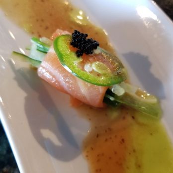 Sakura Grill - I think it's yellow tail rolled up with sliced cucumber, jalapeño, plus a little row. Koma just handed it to me out of the blue. - Japanese Near Me - Ashburn, Virginia Sakura Grill - I think it's yellow tail rolled up with sliced cucumber, jalapeño, plus a little row. Koma just handed it to me out of the blue. - Japanese Near Me - Ashburn, Virginia