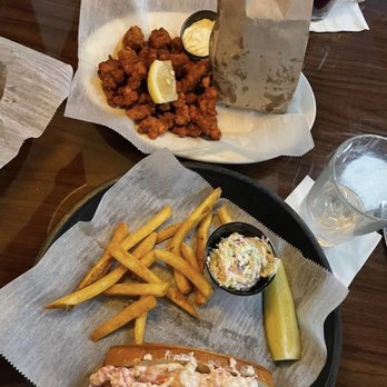 Boston Commons - Cold lobster roll, clam strips and bags of fries (I stole The pickle, it actually comes with the clams) - Seafood Near Me - Nashville, Tennessee