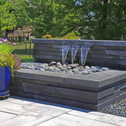 Green View - This water feature brings a sense of calm and visual interest to the landscape.