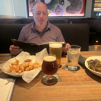 Yard House - Wisconsin Fried Cheese Curds, a Stupid Silly Sour 5.5% Belgian Sour, Belgium, Crispy Brussels Sprouts - New American Near Me - Sarasota, Florida