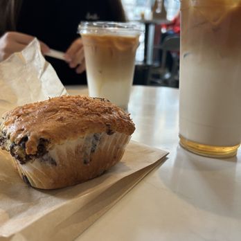 Flour Bakery + Cafe - Vanilla maple syrup latte, coconut chocolate chip muffin - Coffee & Tea Near Me - Cambridge, Massachusetts