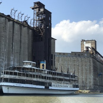 Buffalo River History Tours - Old grain elevators and historic boat passed during tour - Historical Tours Near Me - Buffalo, New York