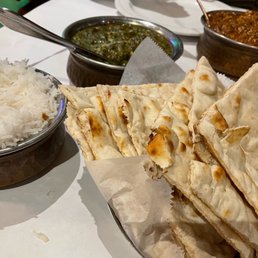 Plain Naan, Rice, Saag Paneer (Palak Paneer) , Goat Curry Plain Naan, Rice, Saag Paneer (Palak Paneer) , Goat Curry