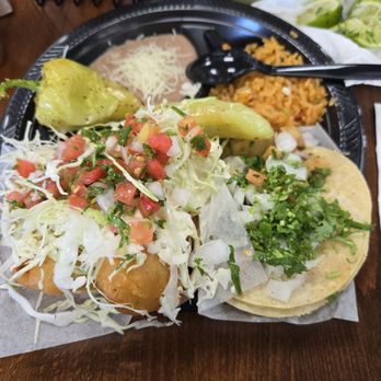 Taco Nazo - 3 Taco Combo plate with rice, beans chile gueritos, From left to right: Shrimp, Fish, Chicken Tacos - Mexican Near Me - Santa Ana, California Taco Nazo - 3 Taco Combo plate with rice, beans chile gueritos, From left to right: Shrimp, Fish, Chicken Tacos - Mexican Near Me - Santa Ana, California