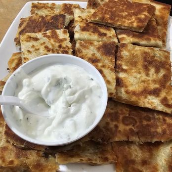 Chopan Kabob - Bolani with mashed potato and green onions with a yogurt cucumber dip. Huge portion for $13.99 - Kebab Near Me - San Ramon, California Chopan Kabob - Bolani with mashed potato and green onions with a yogurt cucumber dip. Huge portion for $13.99 - Kebab Near Me - San Ramon, California