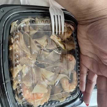 Thai Satay - Hand in photo for size reference. Drunken Noodles With shrimp. - Thai Near Me - Colorado Springs, Colorado