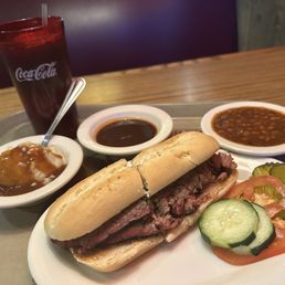 Classic Brisket Sandwich, the sides... mashed potatoes w/ gravy, BBQ beans, and iced tea!