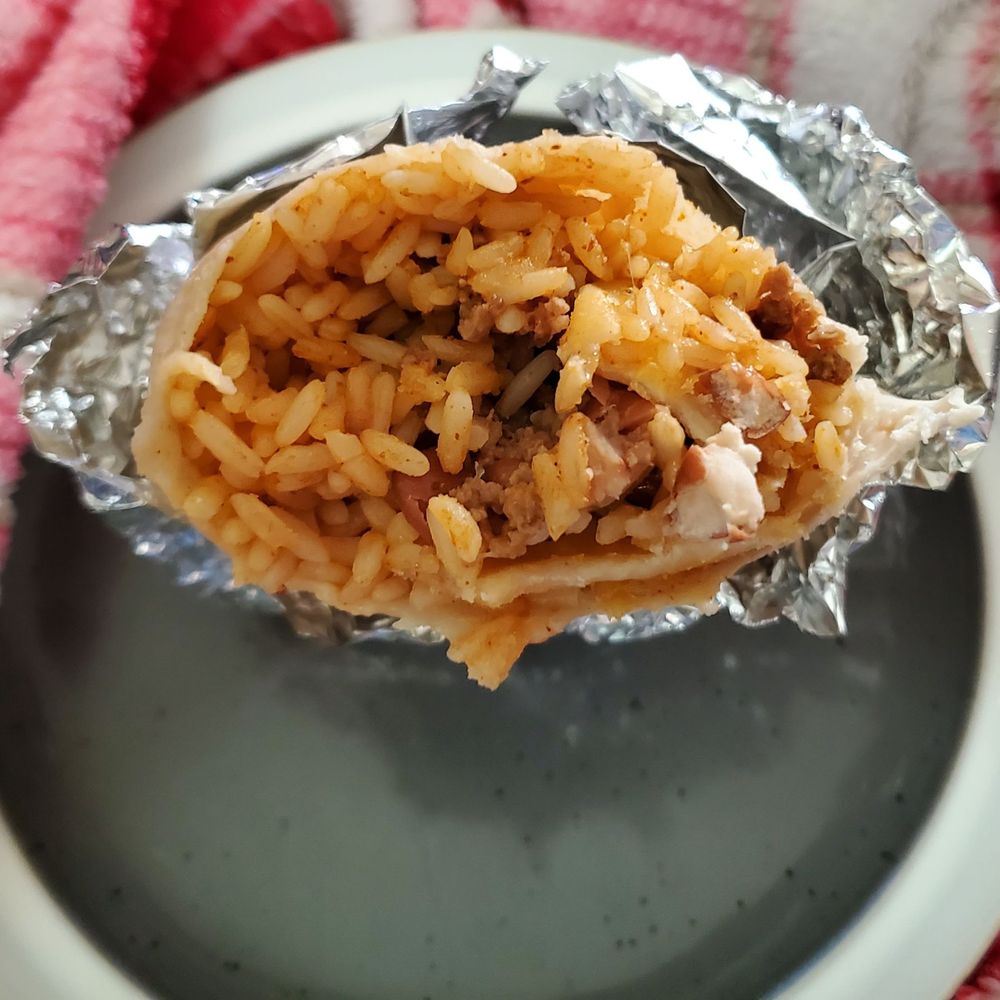 Meat, beans and cheese are supposed to be in this mondito burrito. I don't tasted anything except for rice. Last order 4 me.