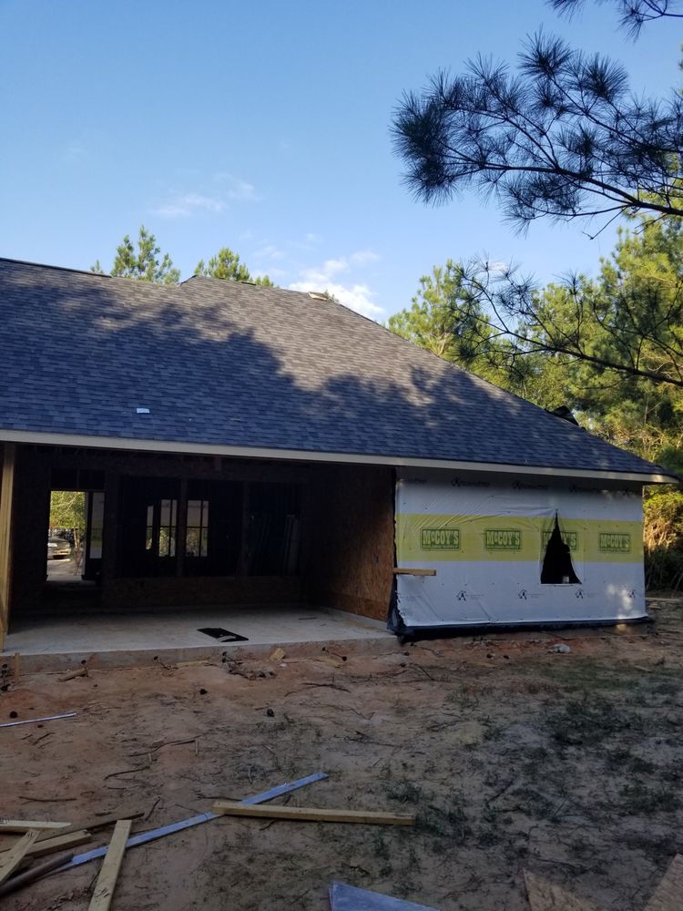 Slide of Red Bull Roofing Solutions