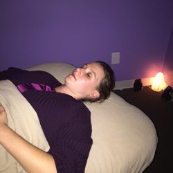 Vital Energy Services - The blissful face of a client after a reiki session