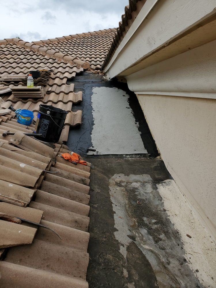 Slide of Rip Tide Roofing