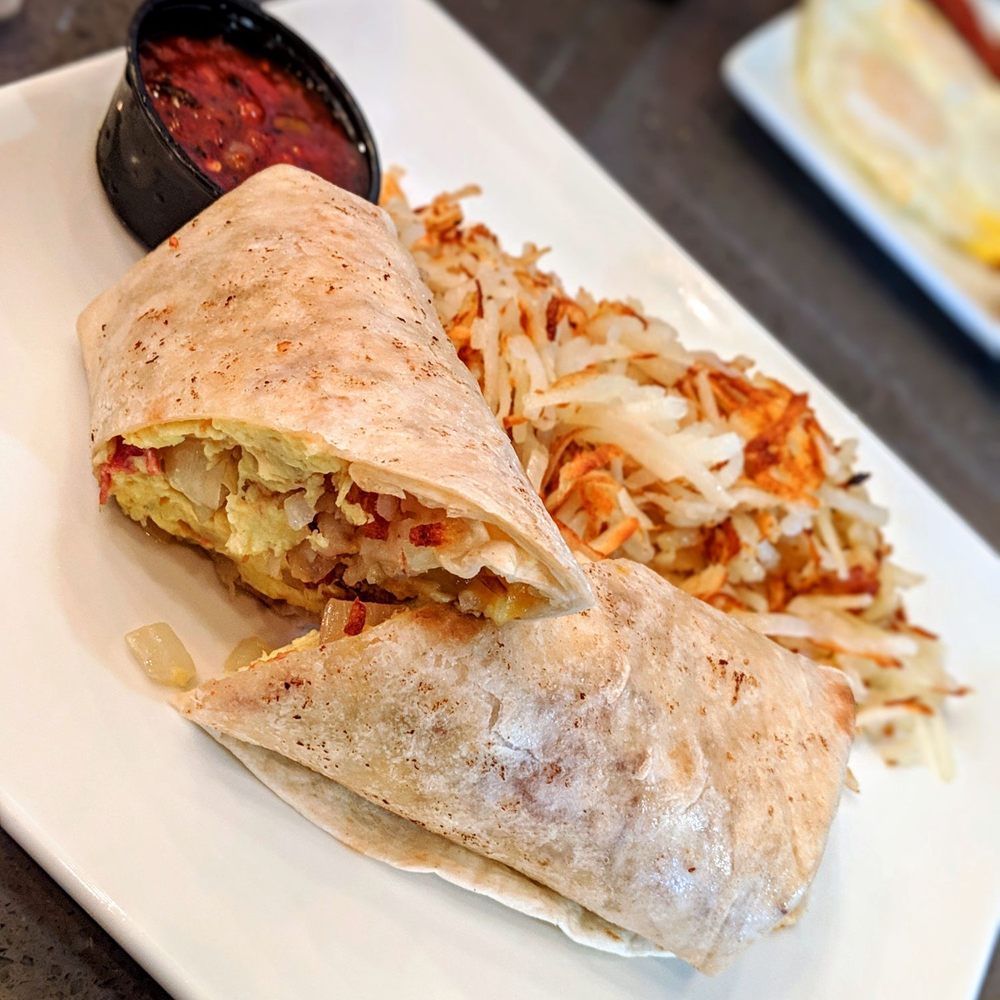 Our Brunch Spot - The Breakfast burrito. (Has hash browns in it so hash browns on the side was a bit much for me personally) - Breakfast & Brunch Near Me - Keller, Texas Our Brunch Spot - The Breakfast burrito. (Has hash browns in it so hash browns on the side was a bit much for me personally) - Breakfast & Brunch Near Me - Keller, Texas