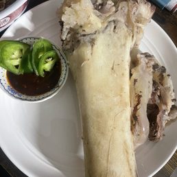 Just one of my big ass bones (came with bone marrow). I had two more I was gonna eat later with the rest of my pho. Just one of my big ass bones (came with bone marrow). I had two more I was gonna eat later with the rest of my pho.