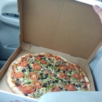 Capri Pizza - So big it needed it's own seat and I had to leave my wife behind. - Pizza Near Me - Middleburg Heights, Ohio