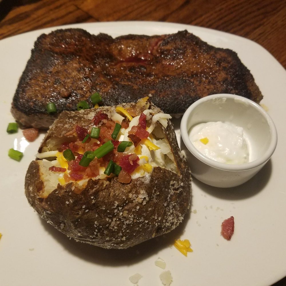 Outback Steakhouse - 18 oz center cut sirloin with a loaded bake potato. - Steakhouses Near Me - Asheville, North Carolina Outback Steakhouse - 18 oz center cut sirloin with a loaded bake potato. - Steakhouses Near Me - Asheville, North Carolina
