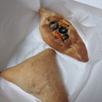 Socotra Coffee House - Spinach pie and a cheese and olive pastry (not sure of the exact name). Both delicious! - Coffee & Tea Near Me - Ann Arbor, Michigan