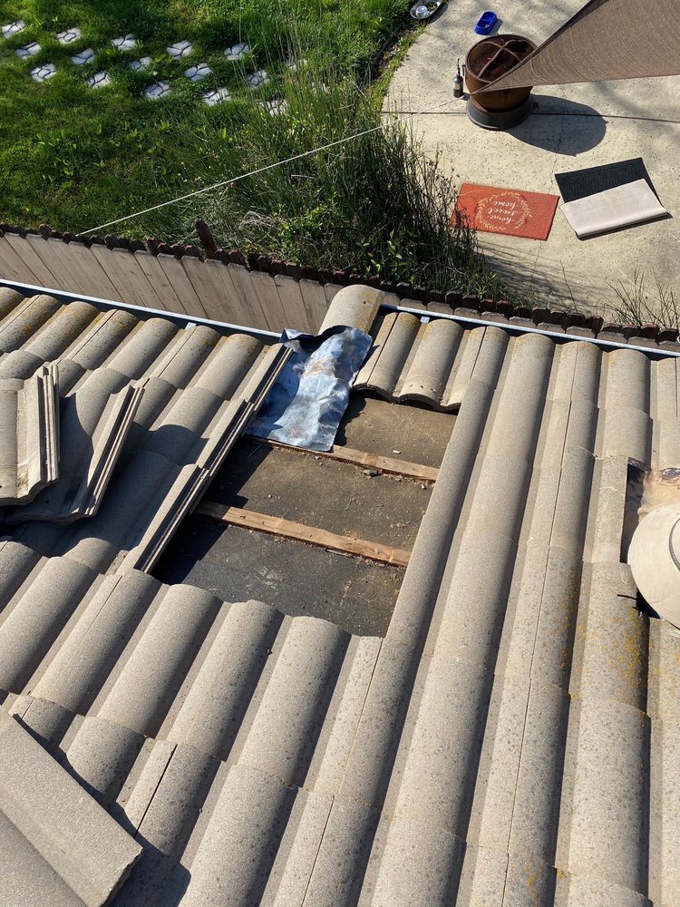 Slide of All Weather Roofing