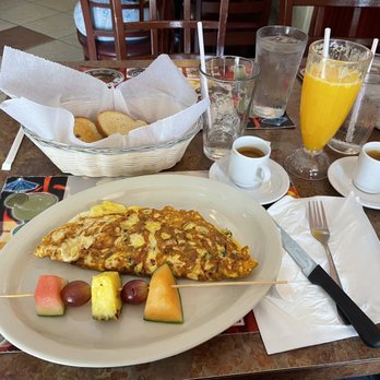 Casa Juan Restaurant - Traditional omelet, white toast, Cuban coffee orange juice and water. Silly but I was really excited about the water! It tasted good! - Latin American Near Me - Miami, Florida Casa Juan Restaurant - Traditional omelet, white toast, Cuban coffee orange juice and water. Silly but I was really excited about the water! It tasted good! - Latin American Near Me - Miami, Florida