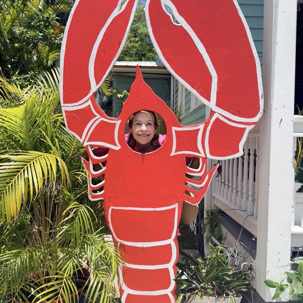 The Lobster Shack Key West - Mom in the lobster cutout out front - Seafood Near Me - Key West, Florida The Lobster Shack Key West - Mom in the lobster cutout out front - Seafood Near Me - Key West, Florida