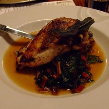 Leon's Full Service - grilled chicken breast, mushroom bread pudding, roasted garlic greens - Gastropubs Near Me - Decatur, Georgia