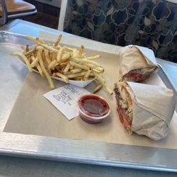 Steak sandwich with fries and Pepsi