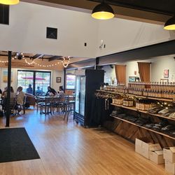 Sap House Meadery - Seating area and retail mead bottles for sale