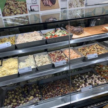 Lucky - a display case filled with different types of food - Grocery Near Me - Pacific Grove, California