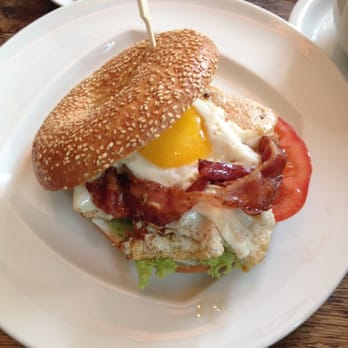 Schöneberger - Sesame bagel with cream cheese, bacon, turkey breast, tomato, lettuce, and egg. - Cafes Near Me - Frankfurt, HE Schöneberger - Sesame bagel with cream cheese, bacon, turkey breast, tomato, lettuce, and egg. - Cafes Near Me - Frankfurt, HE