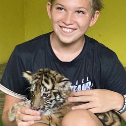 Zoologico De Vallarta - The biggest smile holding a 1yo cub