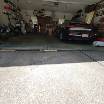 Level Up Concrete Leveling - Before picture of settled driveway/garage transition - Masonry/Concrete Near Me - Macedonia, Ohio Level Up Concrete Leveling - Before picture of settled driveway/garage transition - Masonry/Concrete Near Me - Macedonia, Ohio