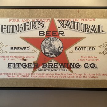 Fitger's Inn - Old ads were framed in the room - Hotels Near Me - Duluth, Minnesota