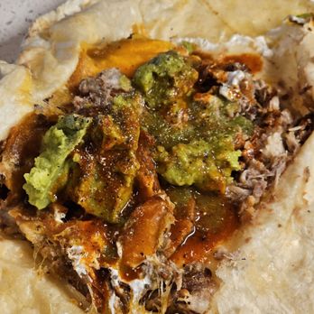 Thyda's Tacos - August 2025: $12 carnitas burrito. Delicious. Added guacamole at home. - Tacos Near Me - Honolulu, Hawaii Thyda's Tacos - August 2025: $12 carnitas burrito. Delicious. Added guacamole at home. - Tacos Near Me - Honolulu, Hawaii