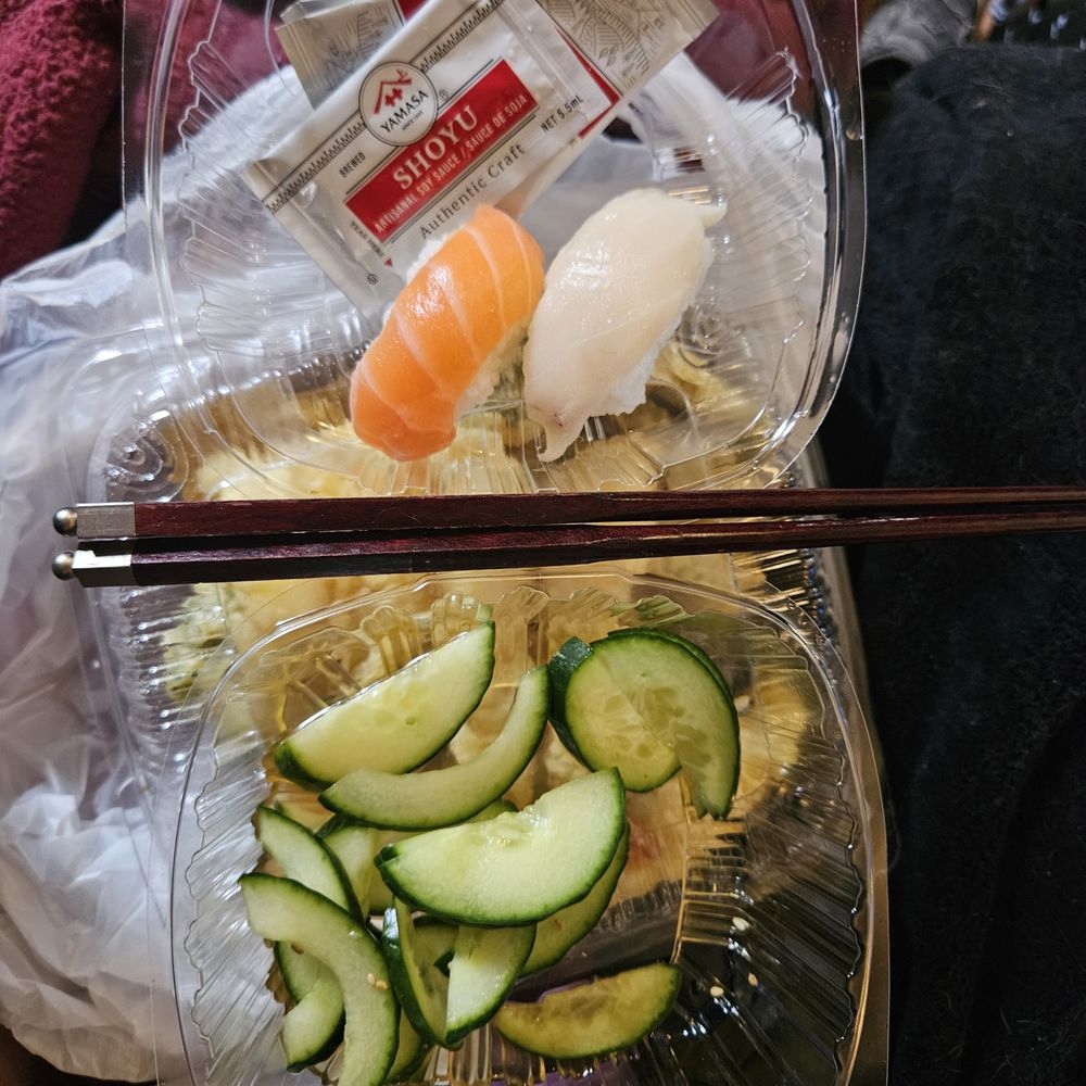 Akira Sushi - 4/27/2025 - Love some salmon & yellowtail nigiri + cucumber salad. Underneath is tempura veggies & shrimp. - Sushi Bars Near Me - Beaverton, Oregon