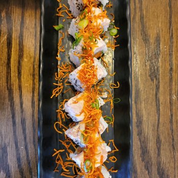 Sushi Taku - a plate of sushi on a wooden table - Japanese Near Me - Vancouver, British Columbia Sushi Taku - a plate of sushi on a wooden table - Japanese Near Me - Vancouver, British Columbia