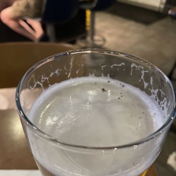 Buffalo Wild Wings - a glass of beer on a table - American Near Me - Denver, Colorado