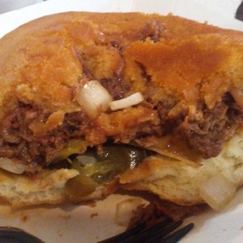 Dave's Smokehouse - Brisket sandwich with onion and pickle - Barbeque Near Me - Seabrook, Texas